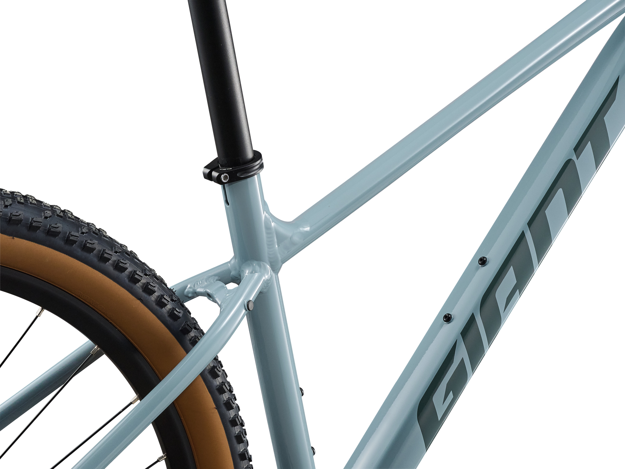 Giant Talon 1 Hardtail-Mountainbike in Dusty Blue mit GIANT Schriftzug und Rahmen-Detailaufnahme.