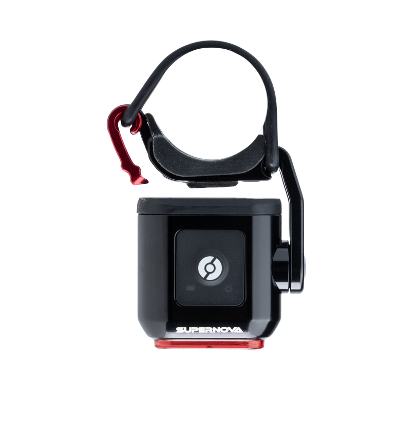 Supernova Redstream Pro Ruecklicht in Schwarz mit flexiblem Gummihalter und rotem LED-Licht.