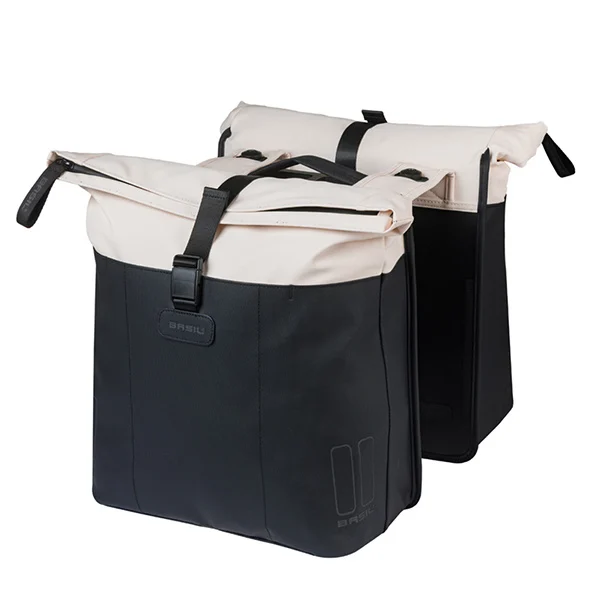 Basil Vive MIK Doppelpacktasche in Off‑White/Schwarz, schräg von vorne, beide Taschen sichtbar.