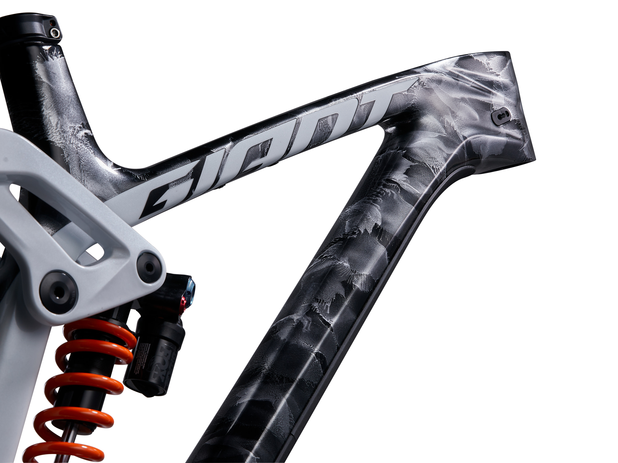Giant Glory Advanced Frameset in Quarry mit Carbon-Hauptrahmen und Daempferaufnahme.