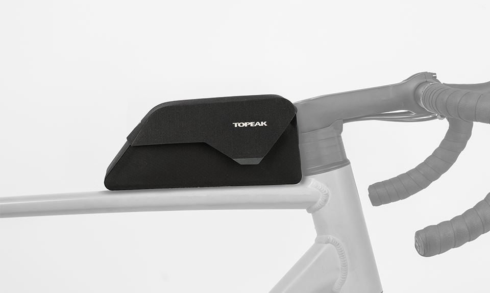 Topeak Toploader Dryshell Rahmentasche montiert auf einem gelben Gravelbike, Nahaufnahme des Oberrohrs.