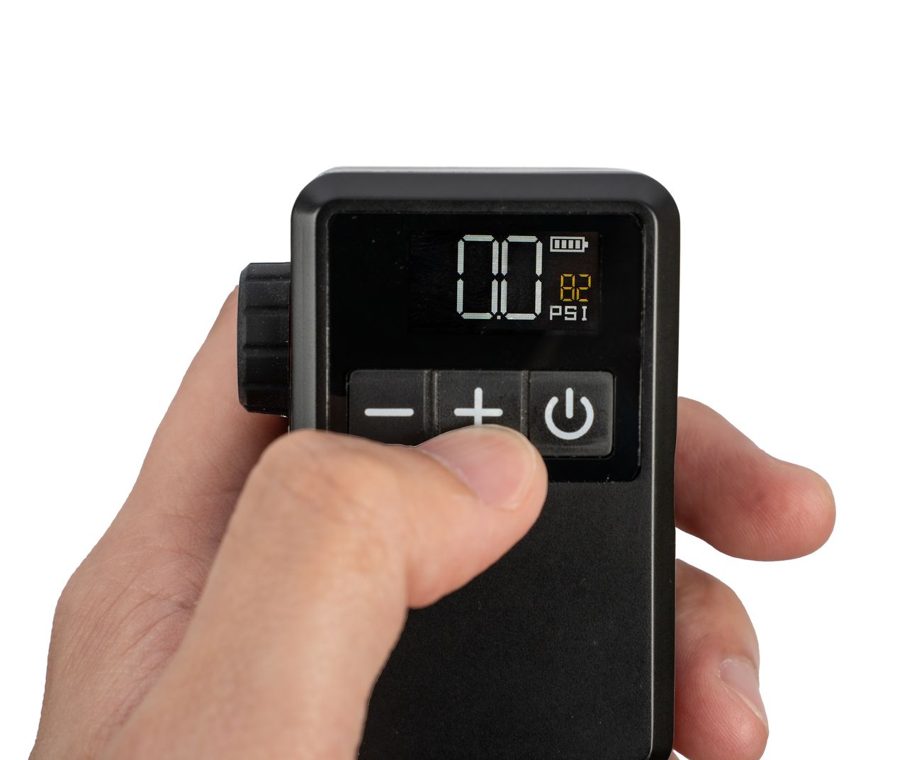 Topeak E-Booster Digital Mini Elektornische Fahrradpumpe, von vorne, gehalten von einer Männerhand