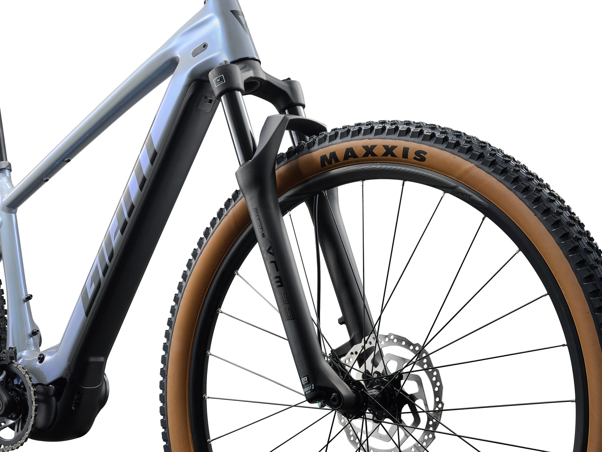 Giant Talon E+ 2 in Moonstone mit Federgabel, Vorderrad und integriertem Akku im Detail.