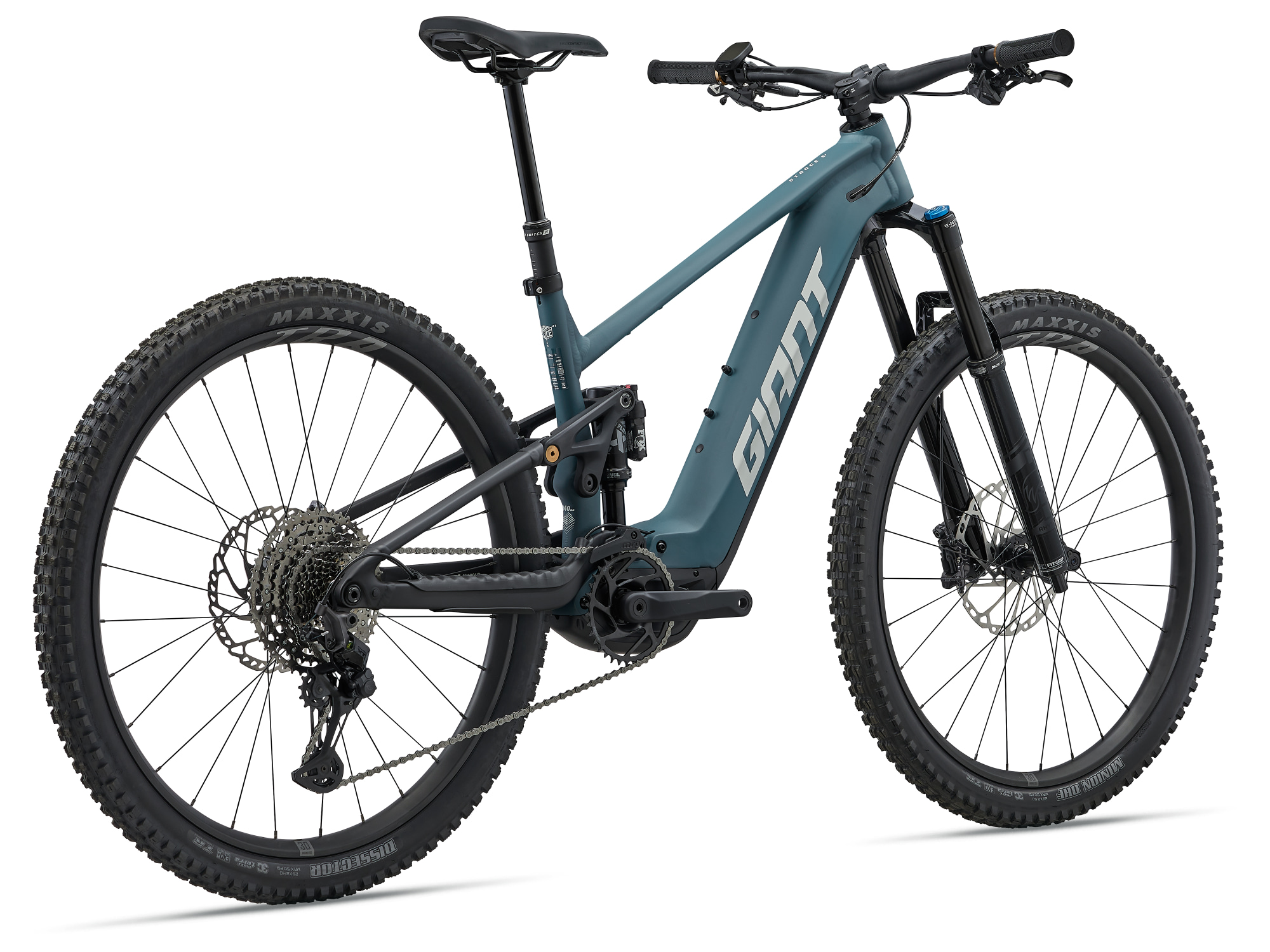 Giant Stance E+ 0 E-MTB Heckansicht in Deep Lake mit Federbein und breiten Reifen.